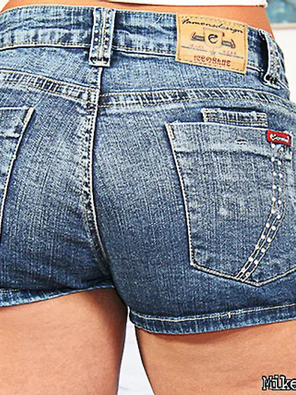 Alluring blonde bitch Sarah James strips her denim shorts and ge