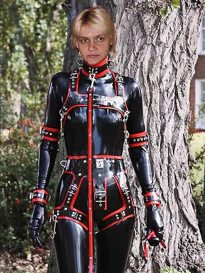 Latex girl in black catsuit