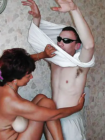 Russian mom Amalia with her son in the kitchen