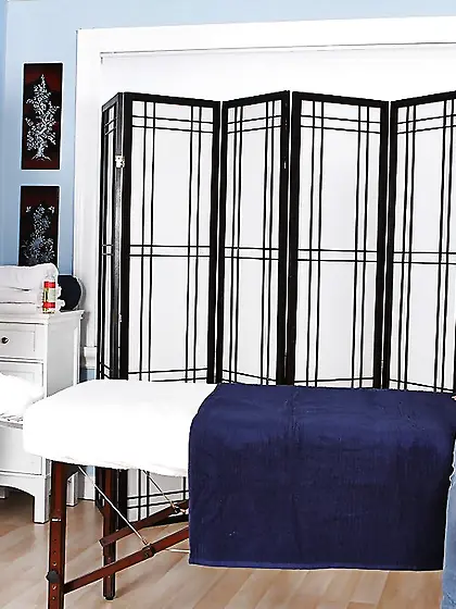 Sexy masseuse gets horny and masturbates with sex toys on the ma