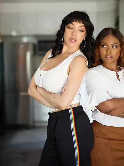 Avery Jane and Little Puck use their tongues to make each other