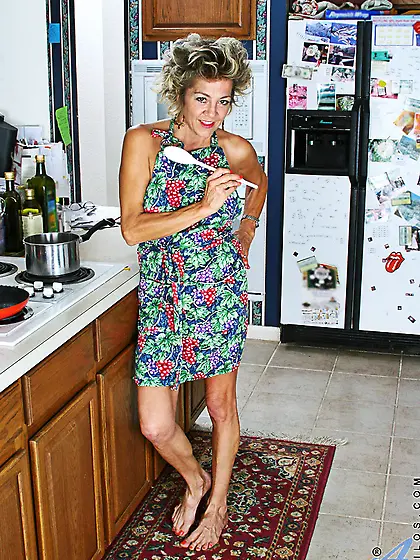 Horny granny stuffs twat