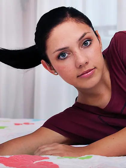 Teen brunette Kantata is sliding off tight jeans from her long s