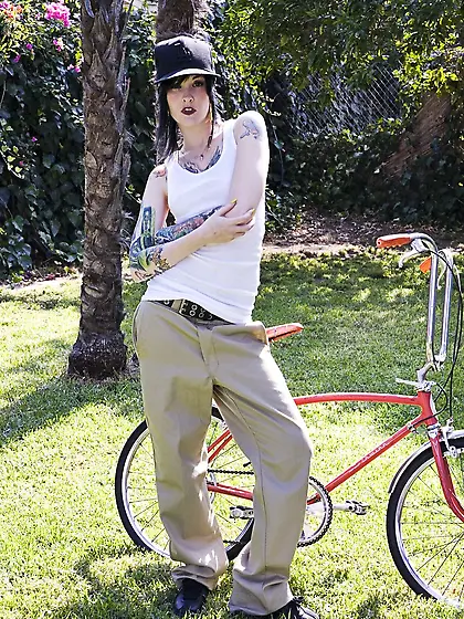 Melodie Gore rides a bike and gets naked in public