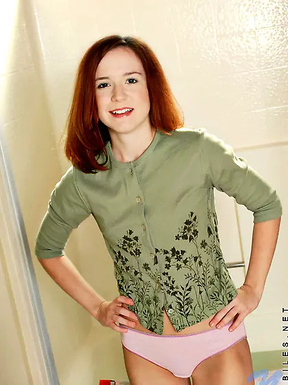 AnnaBelle Lee takes her little pink thongs off before the camera