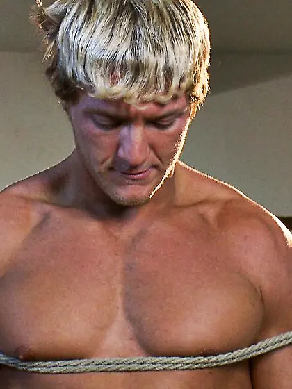 Muscled guy tied stimulated