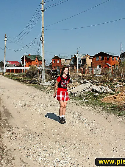 Outdoor pissing of teen brunette shocking villagers