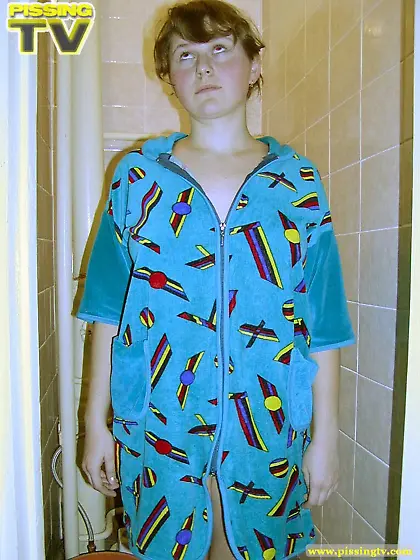 Amateur teen pisses in the toilet