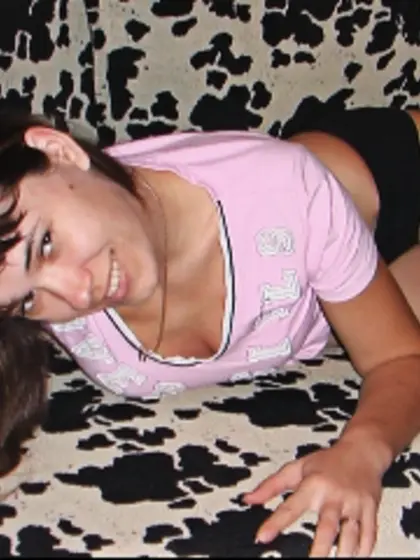 Brunette Andrea Smoking.