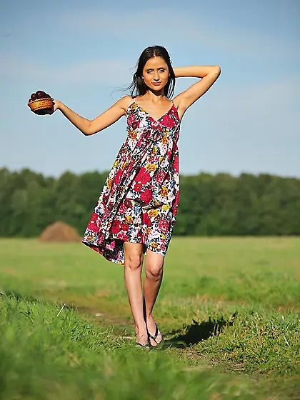 Skinny brunette in a floral print dress is here to show her good