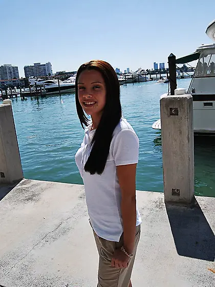 Stripped leggy brunette girl with tight pussy fills herself with