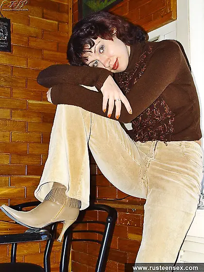 Russian teen brunette shows her pussy on the table