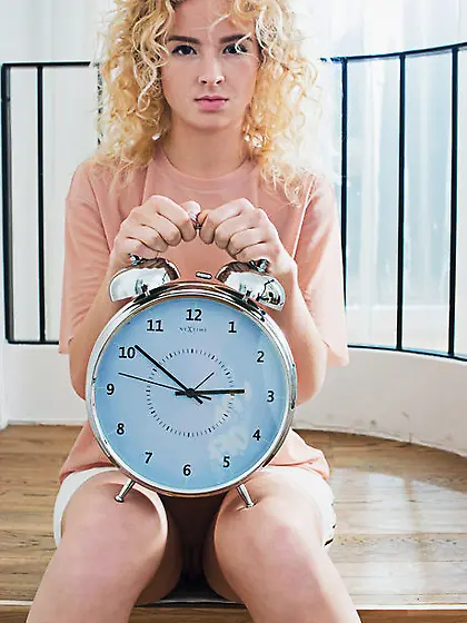 Slim curly-haired blonde demonstrates her teen saved pussy and s