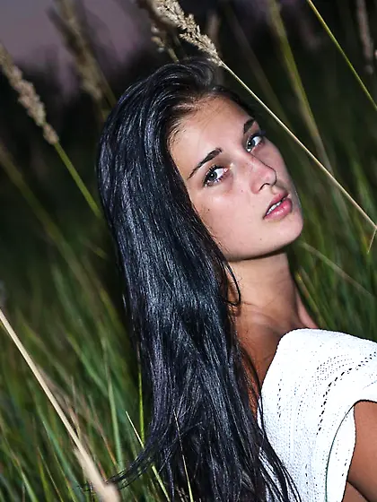 Beautiful brunette teen Katya AC allows the warm sun pet her nic