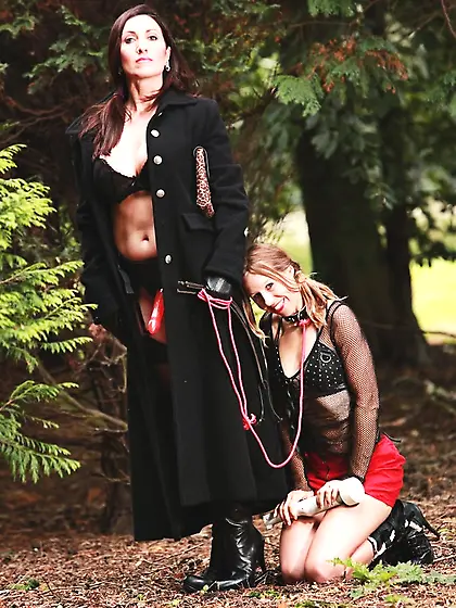 Dominating woman brings slave