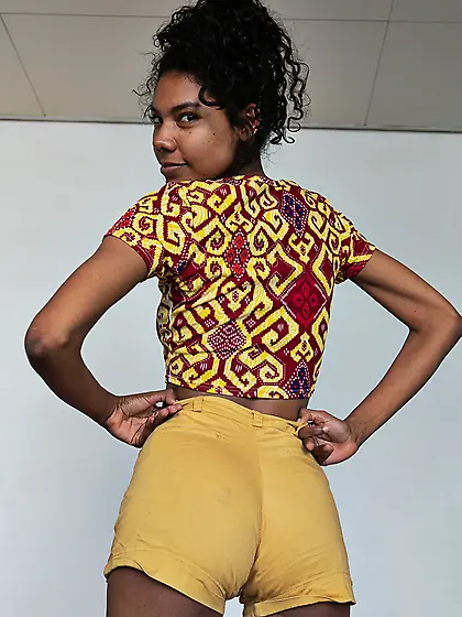 African stunner showing her small breasts and juicy twat