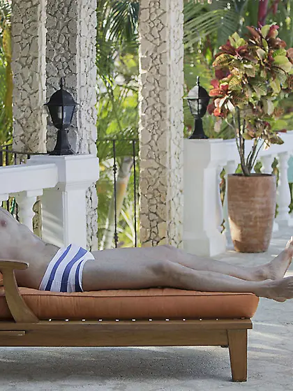 Dark-haired seductress in a sexy bikini gets banged outdoors