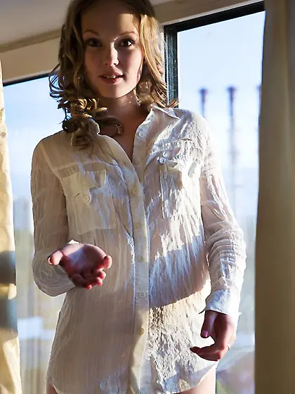 Blonde with a puffy pussy teasing the camera while dancing by th