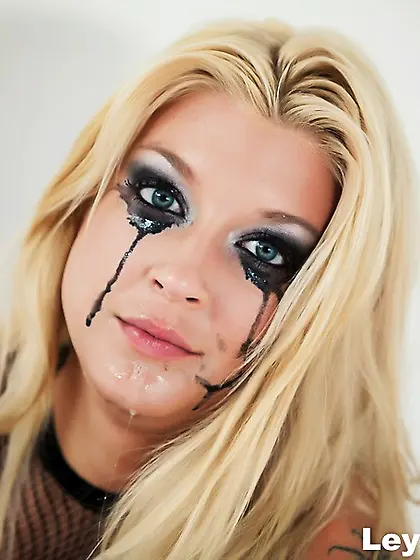 Tattooed blonde heavy makeup