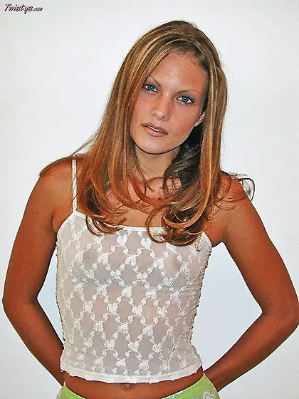 Slim lady sexy posing on camera showing her small titties off an