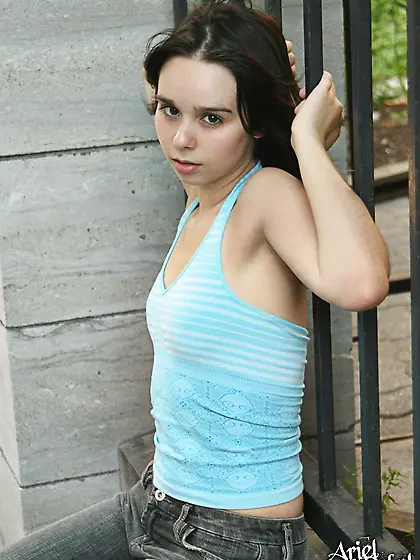 Sweet Ariel Rebel shows off her soles on the stone stair-case of