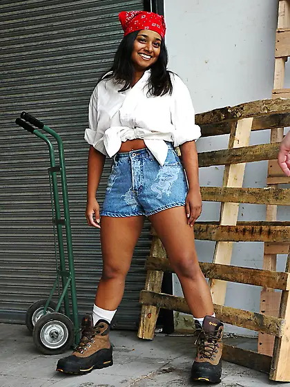 Busty babe posing nude and bending over