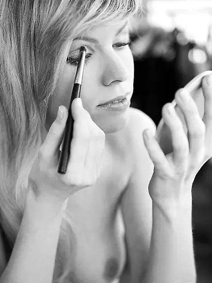 Long haired European babe trying out her favorite outfits.  She l