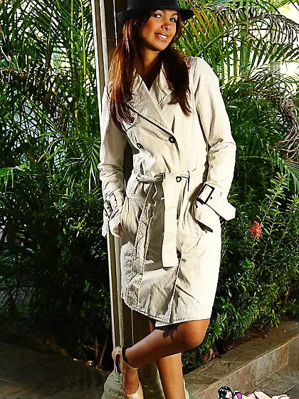 Tanned handsome brunette Karla Spice showing her hot tushy weari