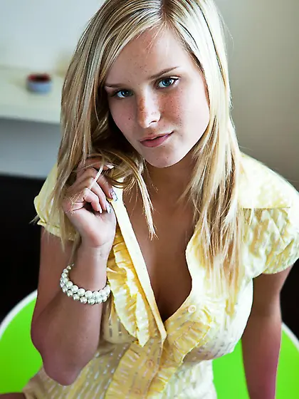 Hot busty blonde Marry Queen takes off her clothes and strikes a