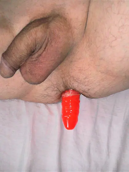 My first red dildo in my ass