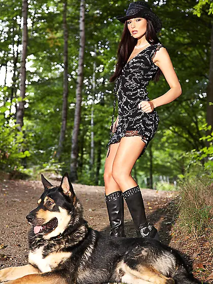 Foxy brunette slut Evelyn Lory strips in the woods and shows her