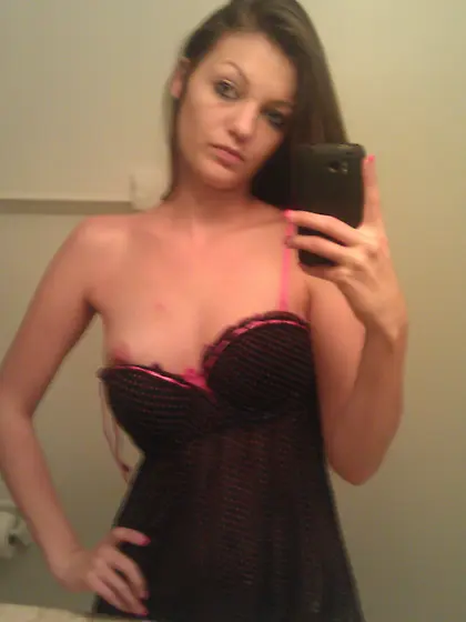 Dark-haired teen snapping sexy selfies and riding a massive cock