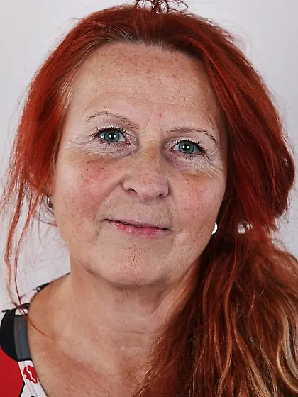 Redhead granny wearing multi-colored