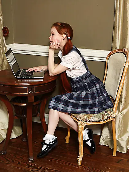 Pigtailed redhead schoolgirl plays