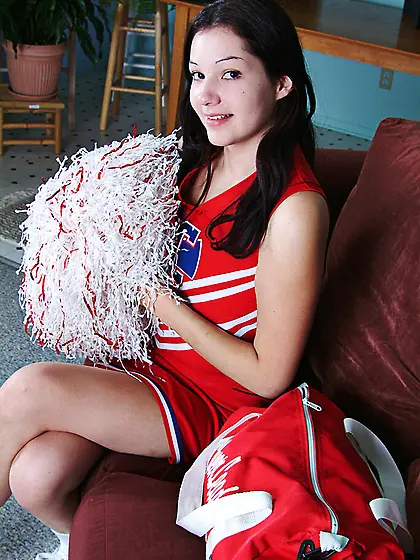 Alluring kitty Kathleen Kruz in red cheerleader uniform takes of