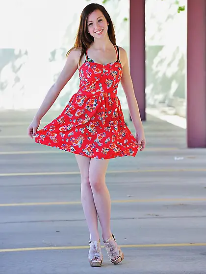 Cute brunette teen Victoria Voss gives a delicious outdoor strip