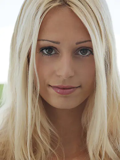 Stunning blonde bares it all for X Art.