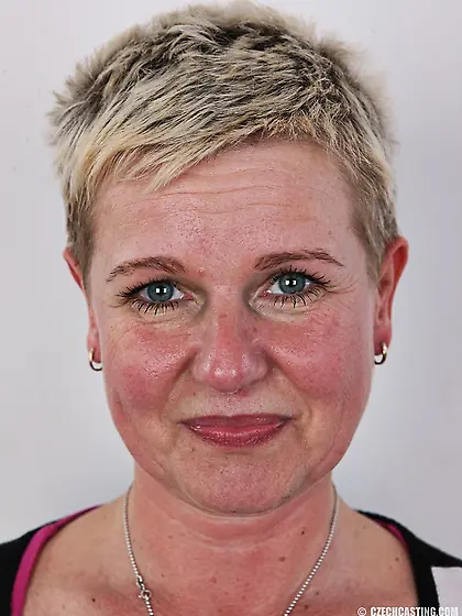 Busty short-haired blonde mature