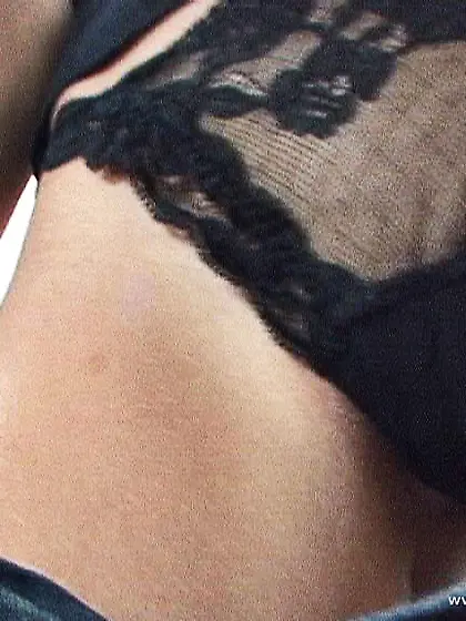 Sophie Paris takes all of her clothes and then fingers her shave