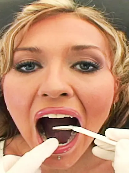 Short-haired blonde sucks dicks