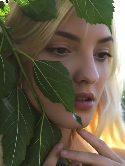 Sensual blonde devouring raspberry and stripping naked outdoors