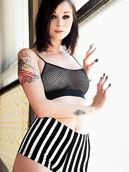 Sweet brunette babe poses