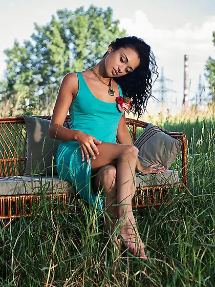 Salacious teen Aprilia B is under the blue sky entertaining with