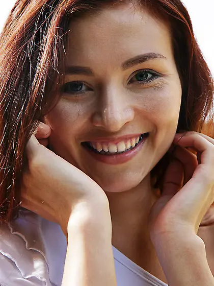 Redhead with no breasts comes out and gets rid of white dress un