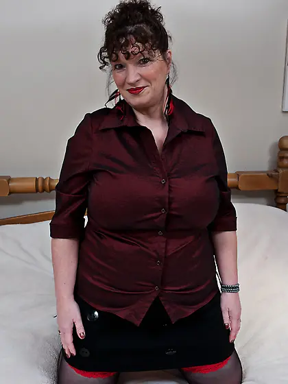 Big Breasted mature Kim S. loves to get naughty