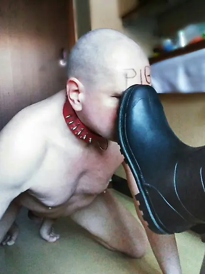 submissive slave licks the dirt from my soles