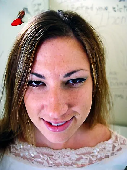 Horny young whore enjoys giving glory-hole blowjob to black dude