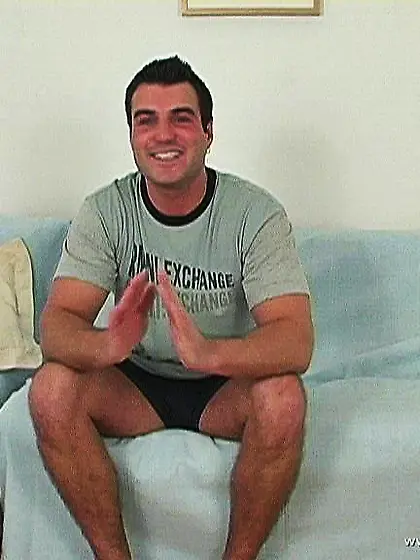 Adriana Russo spreads her sexy legs on the bed and toys her hung