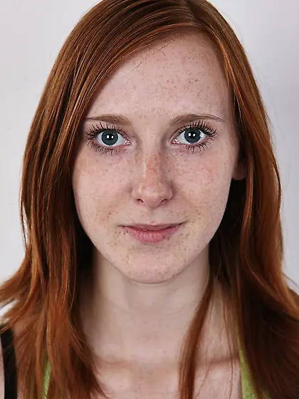 Young attractive redhead perky