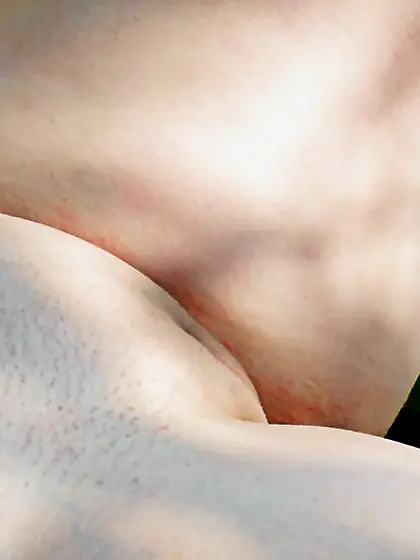 Sunbathing super-hot blonde doll at a lake